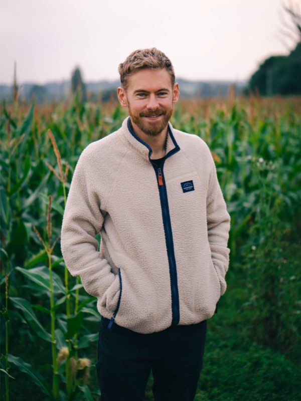Me standing in a field smiling